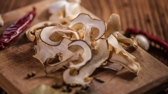 What are the legal considerations and regulations surrounding the use of magic mushrooms for wellness?